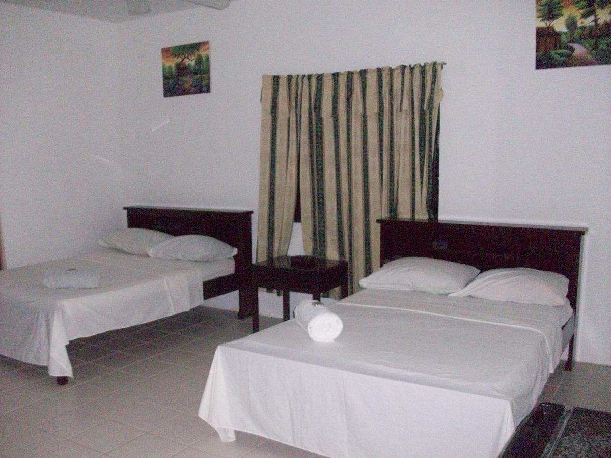 Bermudian Landing Nature Resort חדר תמונה